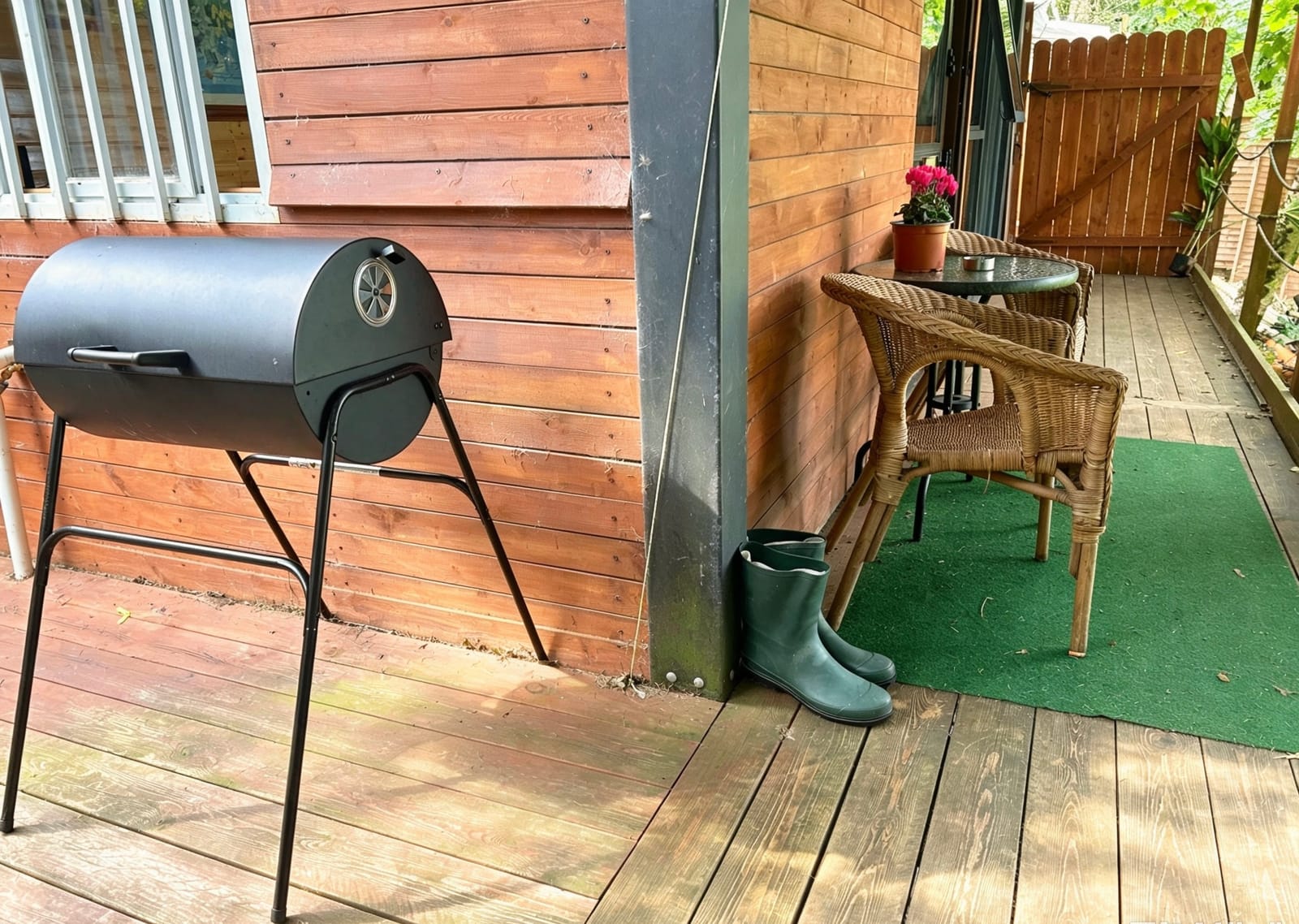 Barbecue and seating on the Farm Cabin deck