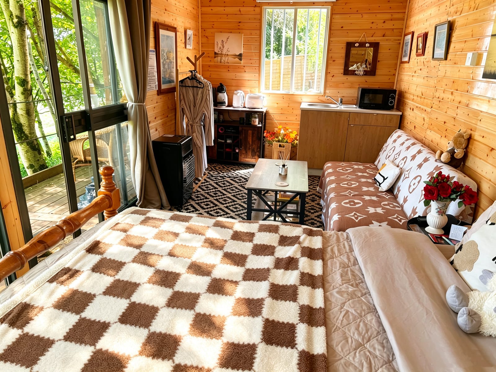 Farm Cabin sleeping area and kitchenette